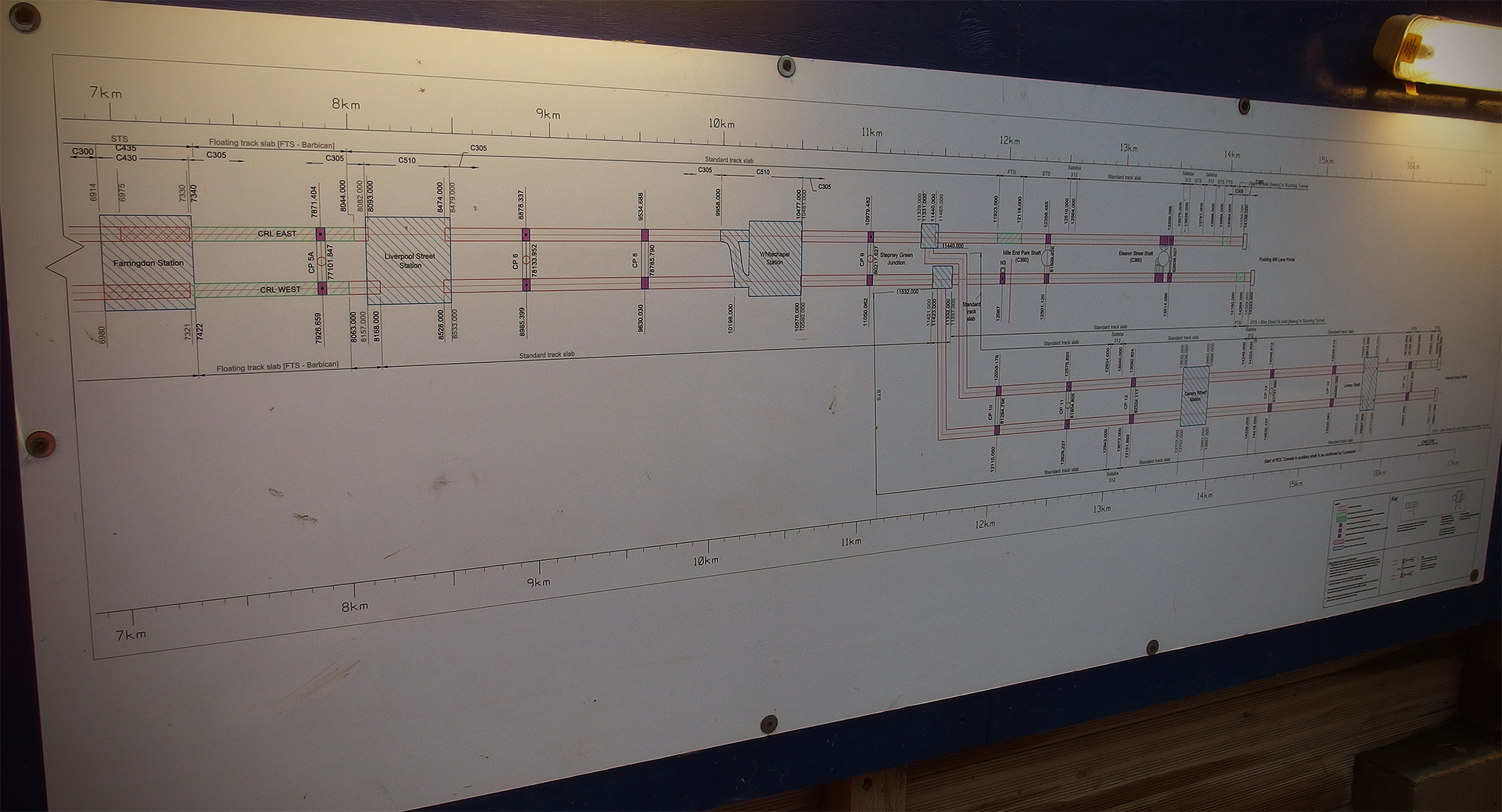A schematic map is mounted on hoardings