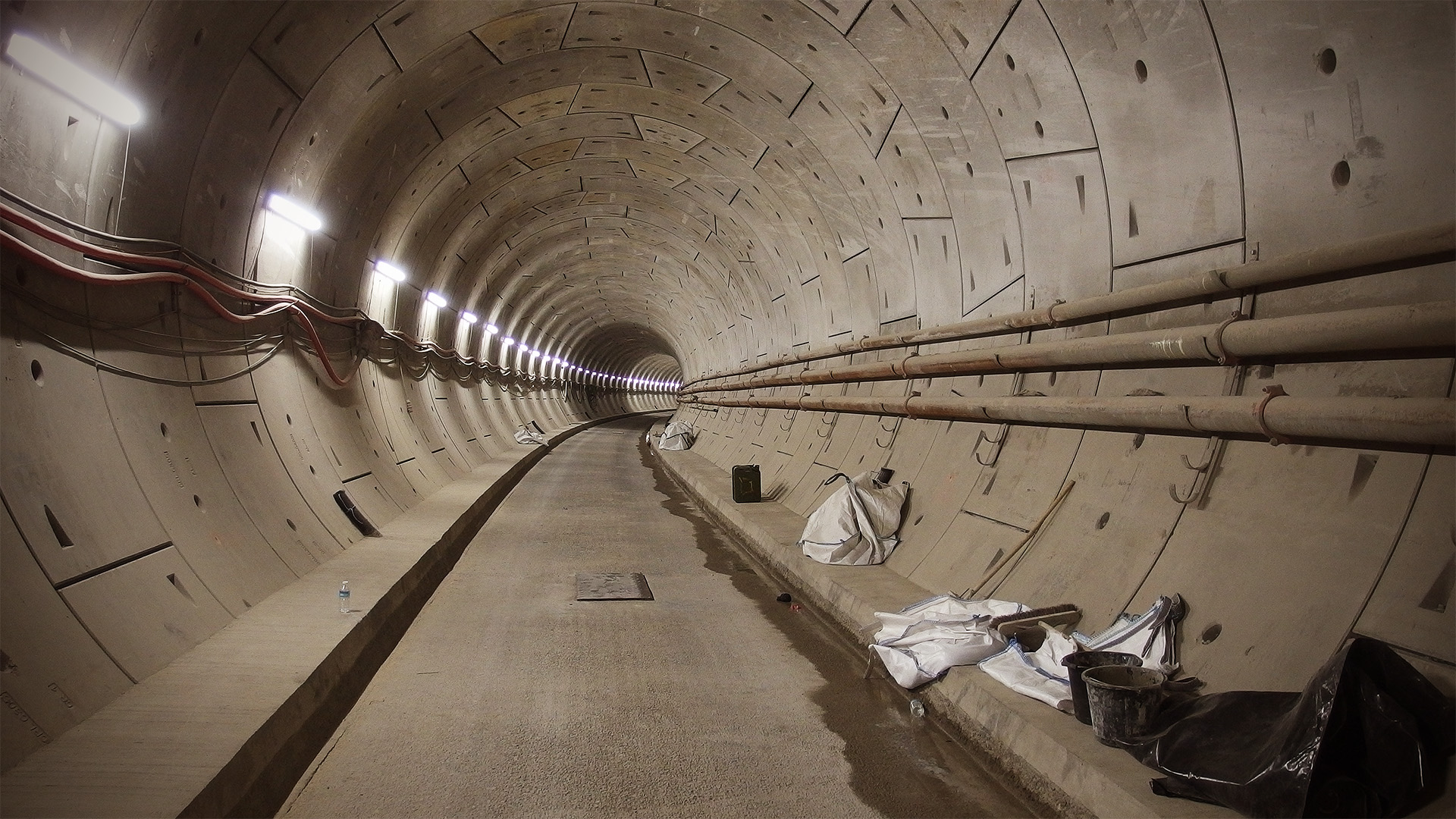 A clean, newly-finished tunnel stretching off into the distance