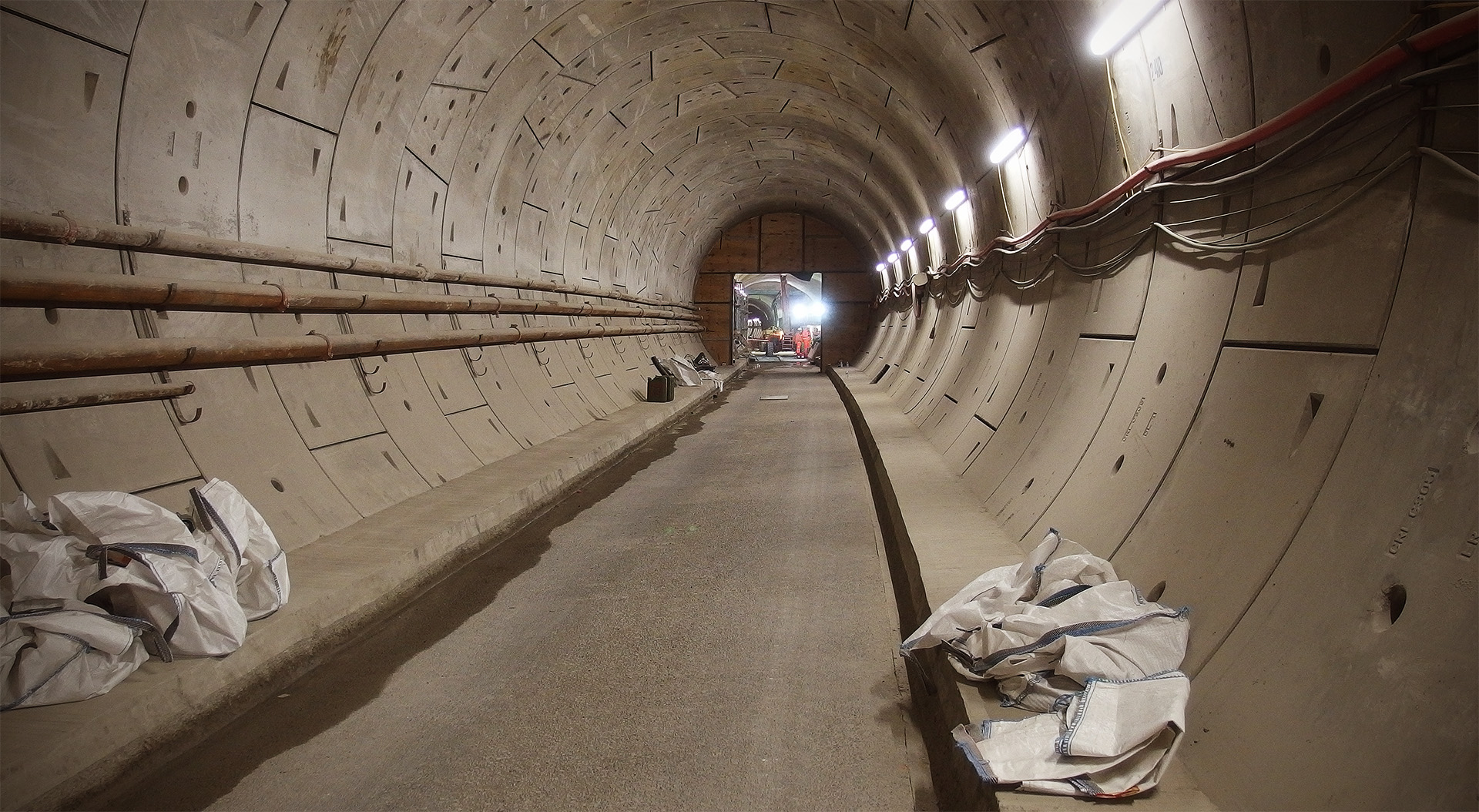 Some wooden panelling protects the entrance to the tunnel