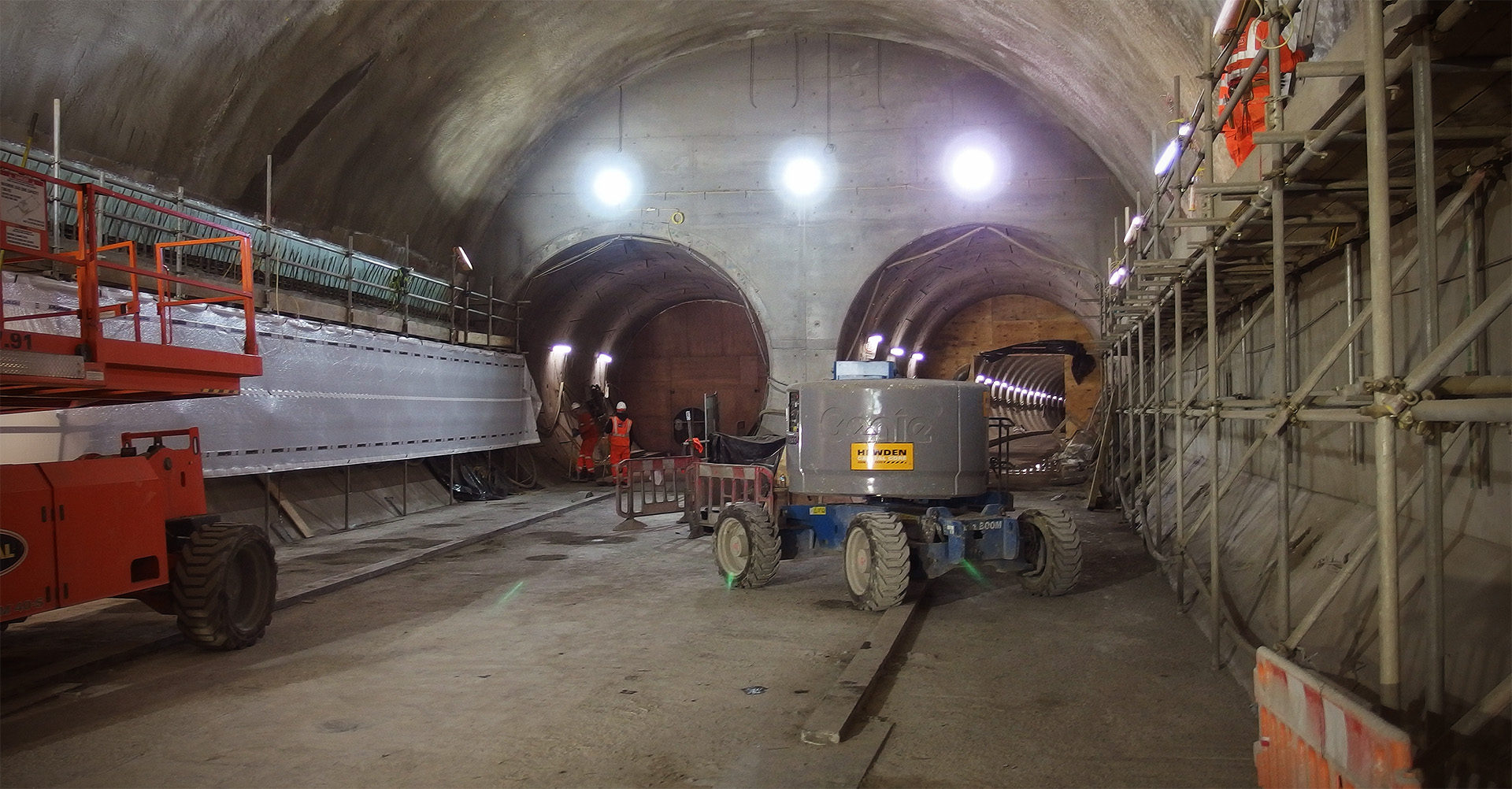 Two smaller tunnels branch away from a larger tunnel